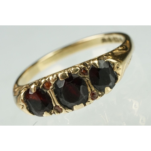 157 - Hallmarked 9ct gold and garnet three stone ring (hallmarked Birmingham 1976, N.5) together with an E... 