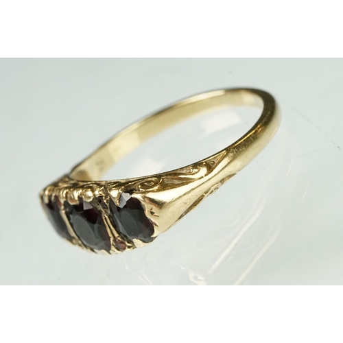 157 - Hallmarked 9ct gold and garnet three stone ring (hallmarked Birmingham 1976, N.5) together with an E... 