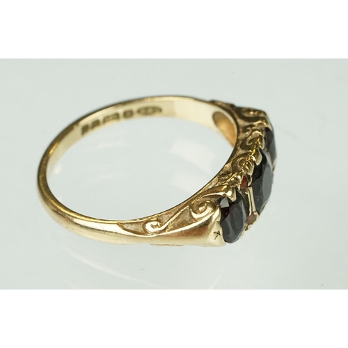 157 - Hallmarked 9ct gold and garnet three stone ring (hallmarked Birmingham 1976, N.5) together with an E... 