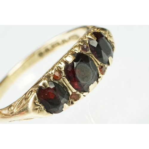 157 - Hallmarked 9ct gold and garnet three stone ring (hallmarked Birmingham 1976, N.5) together with an E... 