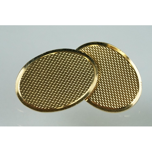 174 - Pair of 9ct yellow gold chain link panel cufflinks, each panel with engraved repeating lozenge decor... 