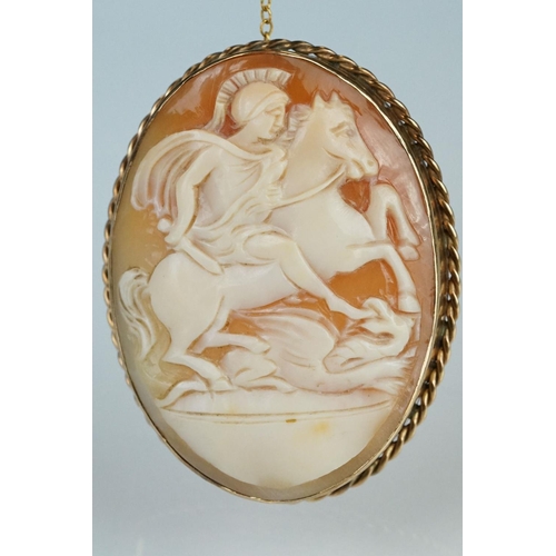 178 - Shell cameo 9ct rose gold brooch, the cameo depicting a Roman centurion riding a horse, rubover set,... 