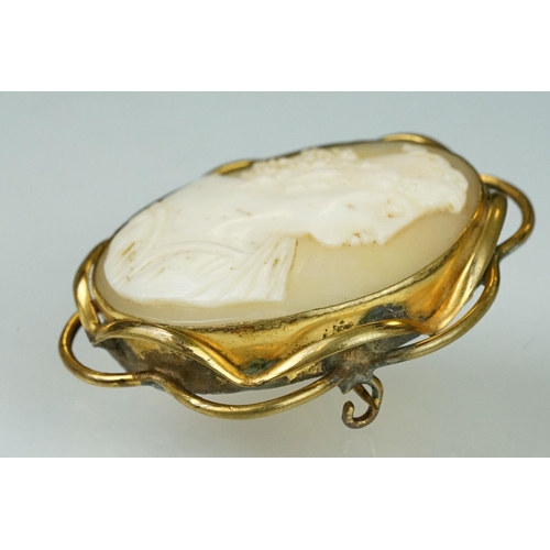 179 - Shell cameo 9ct yellow gold brooch depicting the The Graces; a 19th century shell cameo yellow metal... 