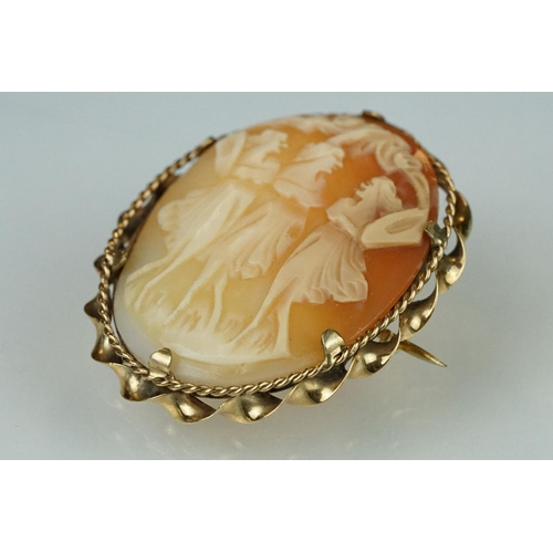 179 - Shell cameo 9ct yellow gold brooch depicting the The Graces; a 19th century shell cameo yellow metal... 