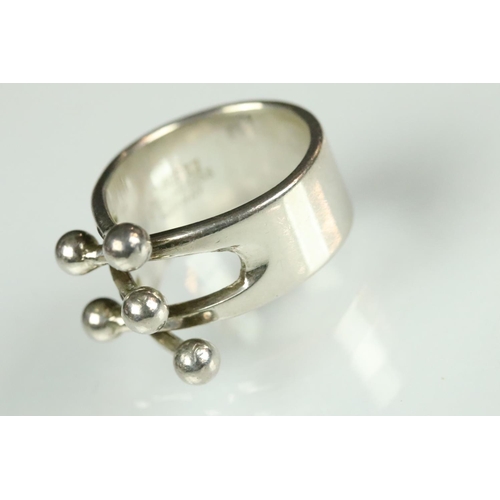 190 - Anna Greta Eker Norwegian silver ring, entwined prongs with ball terminal, ring size N; together wit... 