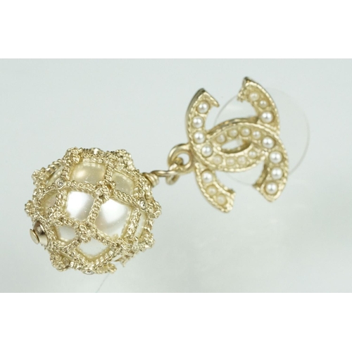 20 - Pair of Chanel costume jewellery earrings having crossed C's to the heads set with simulated pearls ... 