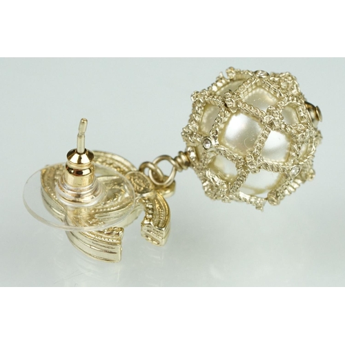 20 - Pair of Chanel costume jewellery earrings having crossed C's to the heads set with simulated pearls ... 