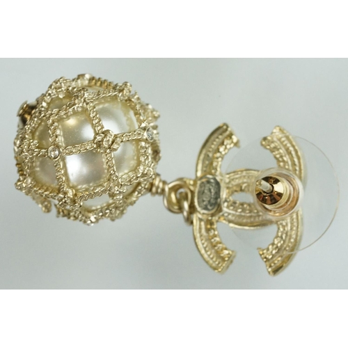 20 - Pair of Chanel costume jewellery earrings having crossed C's to the heads set with simulated pearls ... 