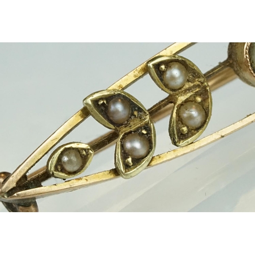 200 - Early 20th century aquamarine and seed pearl 15ct yellow gold marquise brooch, sprig decoration, len... 