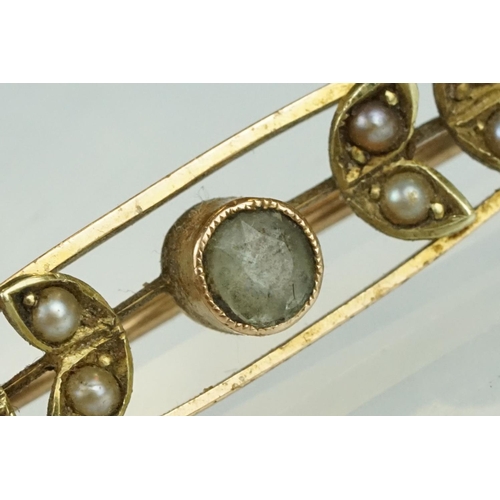 200 - Early 20th century aquamarine and seed pearl 15ct yellow gold marquise brooch, sprig decoration, len... 