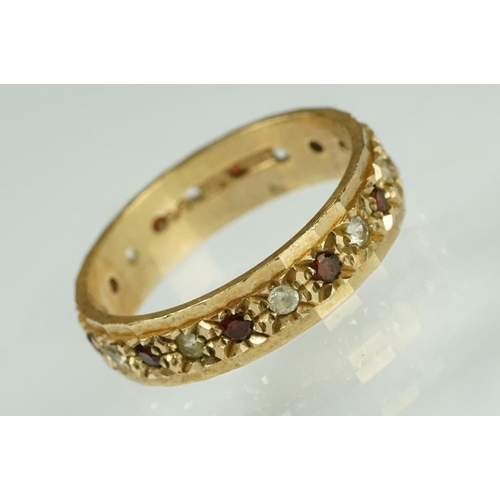 201 - Garnet and white stone 9ct yellow gold eternity ring, ring size M½, width approx 4.5mm; two ladies y... 