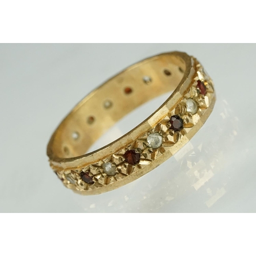 201 - Garnet and white stone 9ct yellow gold eternity ring, ring size M½, width approx 4.5mm; two ladies y... 