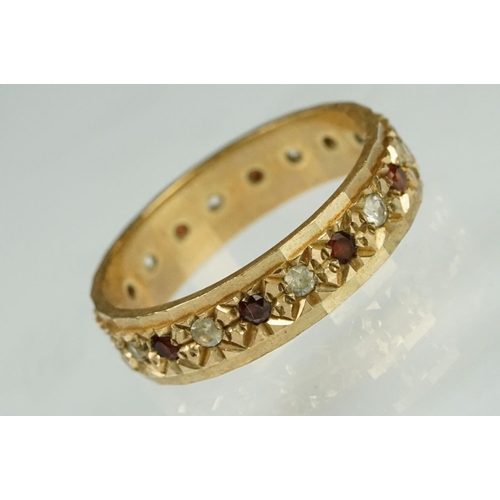 201 - Garnet and white stone 9ct yellow gold eternity ring, ring size M½, width approx 4.5mm; two ladies y... 