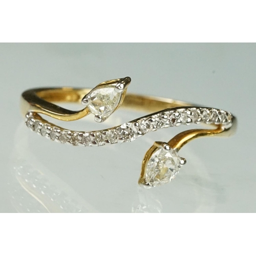 39 - Diamond 14ct yellow gold ring, two pear shaped diamonds, claw set, dimensions approx 2.5mm x 3.5mm, ... 