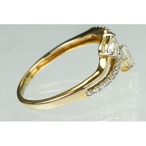 39 - Diamond 14ct yellow gold ring, two pear shaped diamonds, claw set, dimensions approx 2.5mm x 3.5mm, ... 