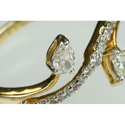 39 - Diamond 14ct yellow gold ring, two pear shaped diamonds, claw set, dimensions approx 2.5mm x 3.5mm, ... 