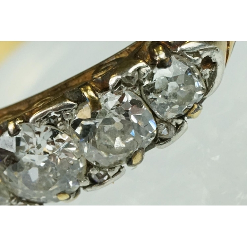 4 - Early 20th century diamond five stone yellow gold and platinum set ring, five graduated old round br... 