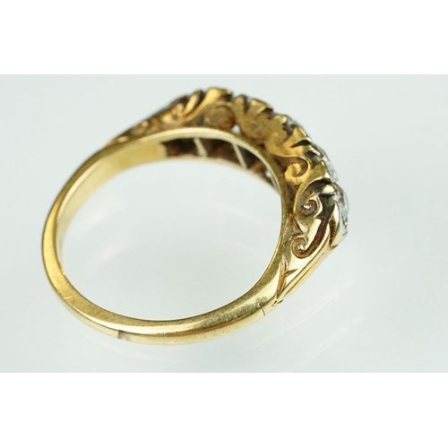 4 - Early 20th century diamond five stone yellow gold and platinum set ring, five graduated old round br... 