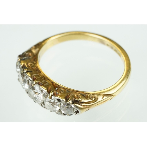 4 - Early 20th century diamond five stone yellow gold and platinum set ring, five graduated old round br... 