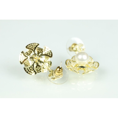 40 - Pair of Chanel costume jewellery earrings having crossed C's to the heads with floral drops suspende... 