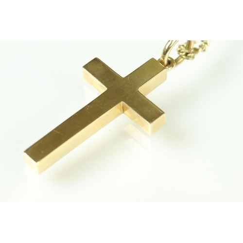 44 - 9ct hallmarked cross pendant with a round bale to top, mounted on a flat link necklace chain with a ... 