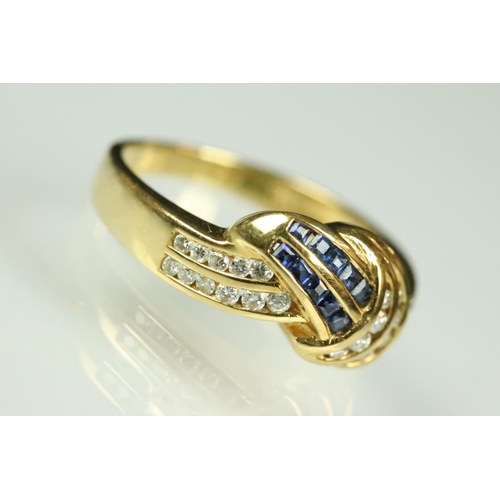 48 - Diamond and sapphire 18ct yellow gold ring, twenty small square cut sapphires, nineteen small round ... 