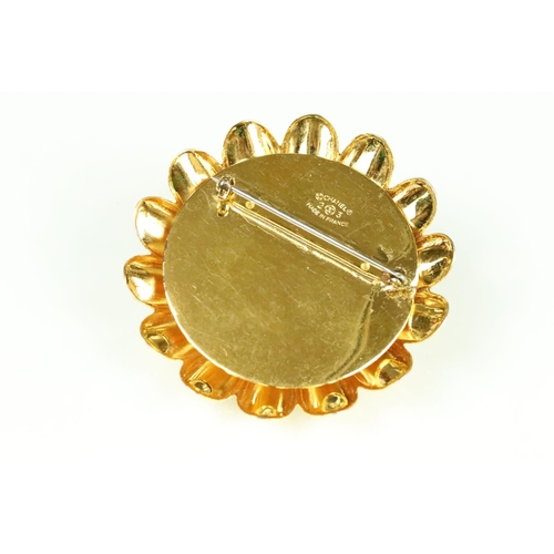 50 - Chanel costume jewellery flower brooch having a large simulated pearl to the centre with gilt petals... 