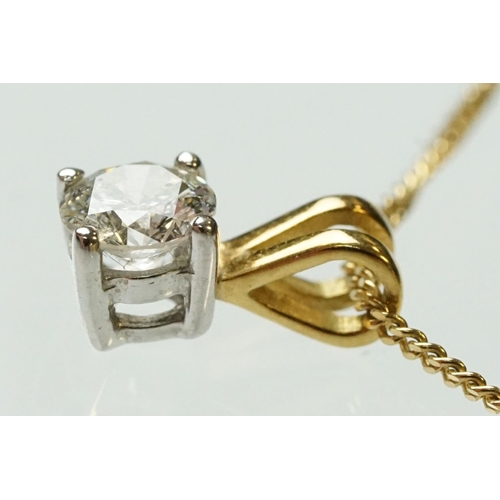 51 - Diamond solitaire 18ct yellow gold pendant necklace, the round brilliant cut diamond weighing approx... 