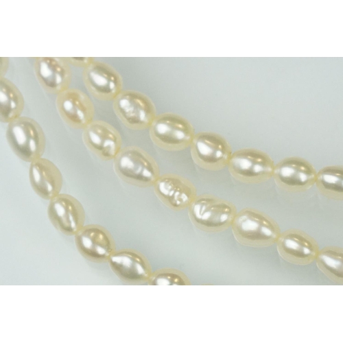 55 - Freshwater pearl three strand necklace with 18ct yellow gold hook and box clasp, length approx 46cm,... 