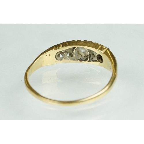 63 - Edwardian diamond 18ct yellow gold five stone boat head ring, five graduated old round brilliant cut... 