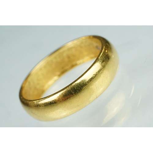 65 - 22ct yellow gold wedding band, D shank, plain polished, band width approx 5.5mm, ring size O½