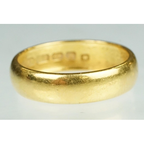 65 - 22ct yellow gold wedding band, D shank, plain polished, band width approx 5.5mm, ring size O½