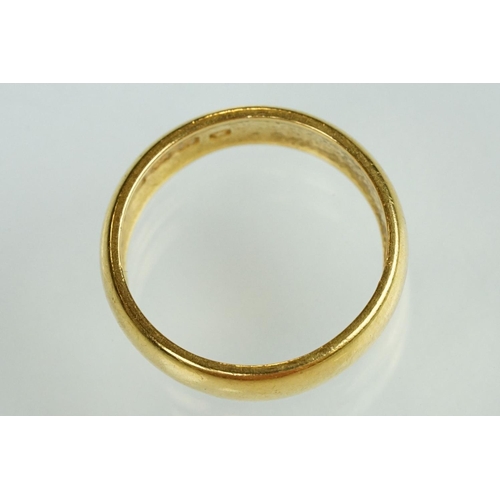 65 - 22ct yellow gold wedding band, D shank, plain polished, band width approx 5.5mm, ring size O½