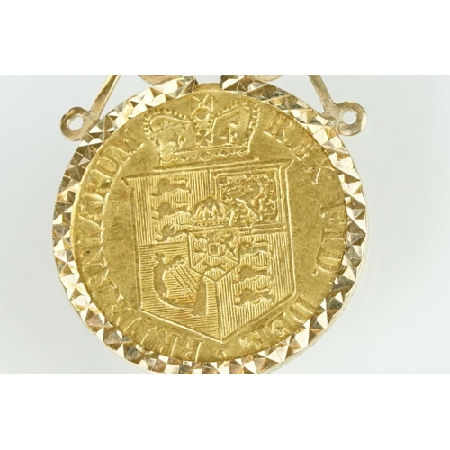 67 - George III half guinea coin pendant, the half guinea dated 1817, shield back, yellow metal mount