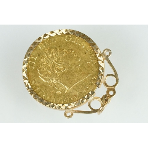 67 - George III half guinea coin pendant, the half guinea dated 1817, shield back, yellow metal mount