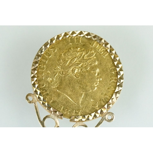 67 - George III half guinea coin pendant, the half guinea dated 1817, shield back, yellow metal mount