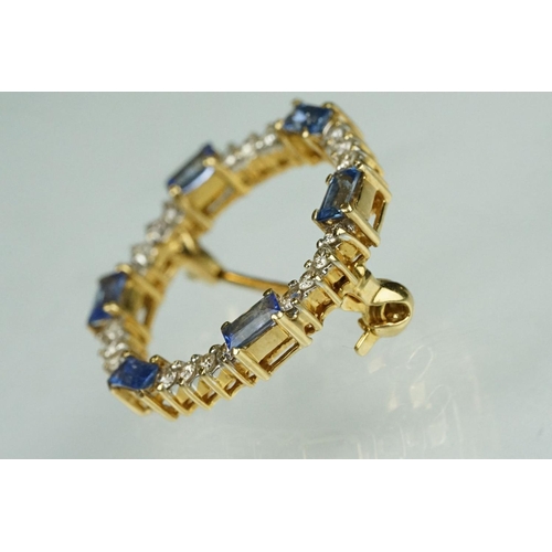 68 - Sapphire and diamond 18ct yellow gold wreath brooch, six baguette cut sapphires, dimensions approx 2... 