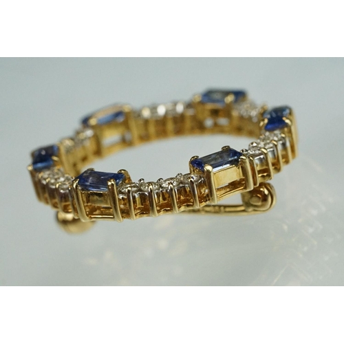 68 - Sapphire and diamond 18ct yellow gold wreath brooch, six baguette cut sapphires, dimensions approx 2... 