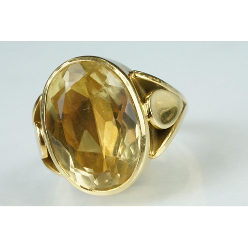 7 - Citrine 18ct yellow gold ring, the oval cut citrine measuring approx 17.5mm x 12.5mm, rubover set, c... 