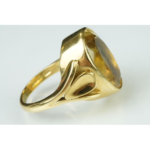 7 - Citrine 18ct yellow gold ring, the oval cut citrine measuring approx 17.5mm x 12.5mm, rubover set, c... 