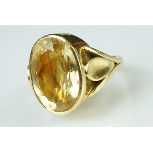 7 - Citrine 18ct yellow gold ring, the oval cut citrine measuring approx 17.5mm x 12.5mm, rubover set, c... 