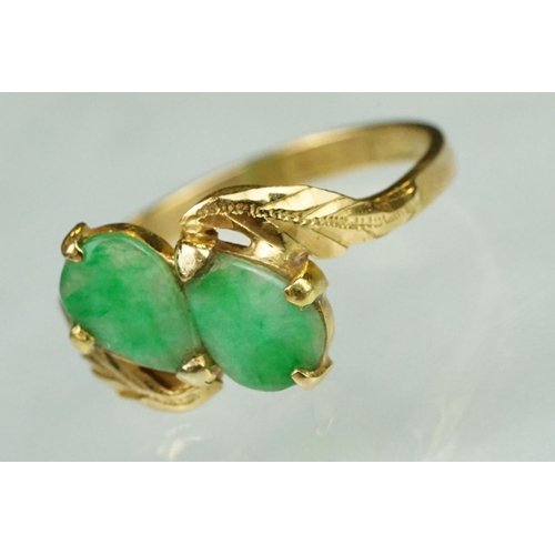 70 - Jade 22ct yellow gold two stone ring, two pear shaped cabochon cut jade panels, dimensions approx 6.... 