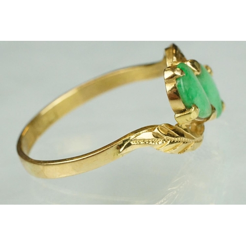 70 - Jade 22ct yellow gold two stone ring, two pear shaped cabochon cut jade panels, dimensions approx 6.... 