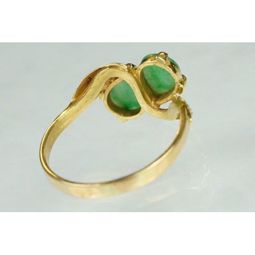 70 - Jade 22ct yellow gold two stone ring, two pear shaped cabochon cut jade panels, dimensions approx 6.... 