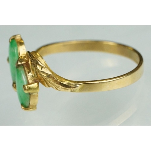 70 - Jade 22ct yellow gold two stone ring, two pear shaped cabochon cut jade panels, dimensions approx 6.... 