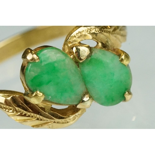 70 - Jade 22ct yellow gold two stone ring, two pear shaped cabochon cut jade panels, dimensions approx 6.... 