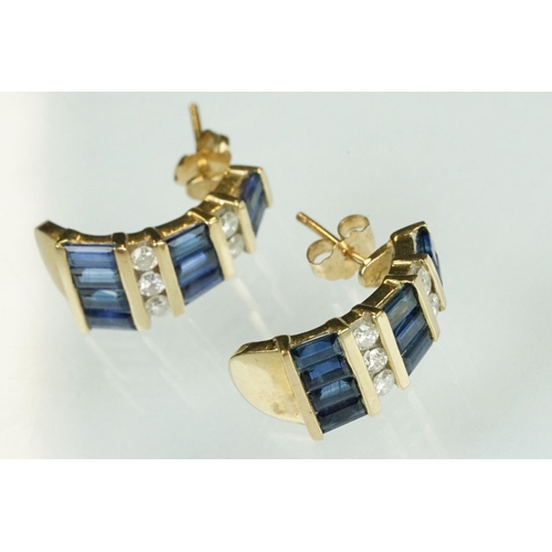 71 - Pair of sapphire and diamond 10ct yellow gold tapered earrings, nine baguette cut sapphires, channel... 