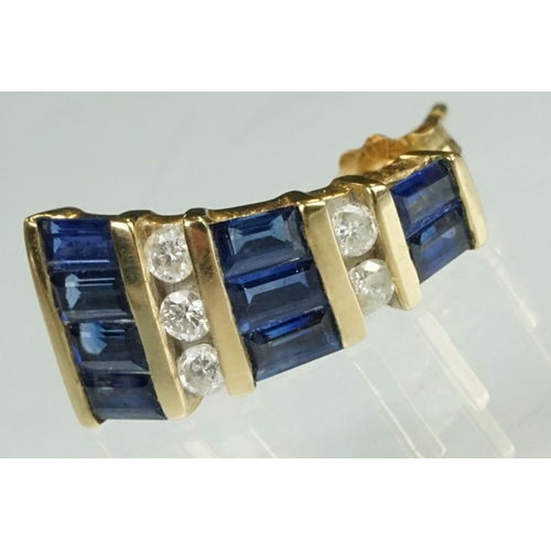 71 - Pair of sapphire and diamond 10ct yellow gold tapered earrings, nine baguette cut sapphires, channel... 