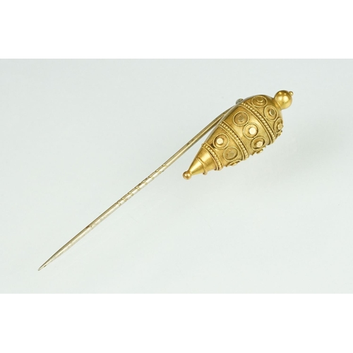 72 - 19th century yellow metal stick pin, the Etruscan Revival tapered head with bead and rope twist deta... 