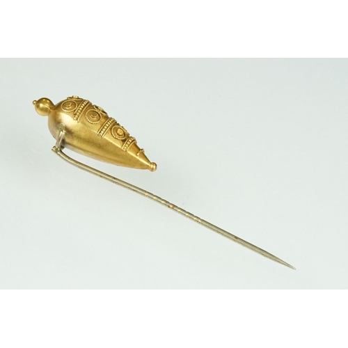 72 - 19th century yellow metal stick pin, the Etruscan Revival tapered head with bead and rope twist deta... 